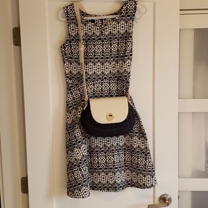 Basket wicker purse with leather flap